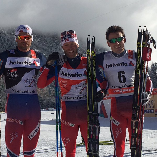 The all-Norwegian men's 10 k freestyle pursuit podium on Sunday at Stage 3 of the Tour de Ski in Lenzerheide, Switzerland, with winner Martin Johnsrud Sundby (c), Petter Northug (l) in second, and Finn Hagen Krogh (r) in third. (Photo: FIS Cross Country/Twitter)