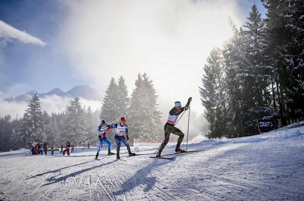 American Noah Hoffman (25) chases Germany's Jonas Dobler (r) during the 10 k freestyle pursuit at Stage 3 of the Tour de Ski in Lenzerheide, Switzerland. Hoffman held his position to finish 25th. (Photo: Madshus/NordicFocus)