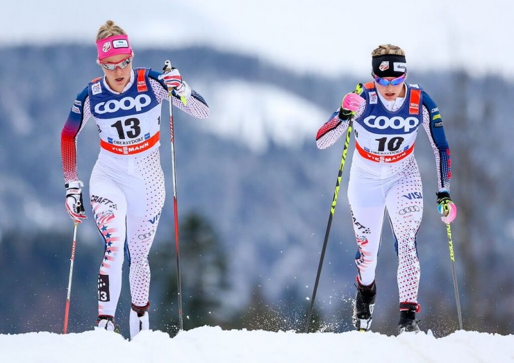 Fellow U.S. Ski Team members Sadie Bjornsen (l) and Jessie Diggins (r) started near each other in Wednesday's 10 k classic mass start at Stage 5 of the Tour de Ski in Oberstdorf, Germany. Diggins went on to place 23rd and Bjornsen 26th for 12th and 14th overall, respectively, in the Tour standings. (Photo: Marcel Hilger)