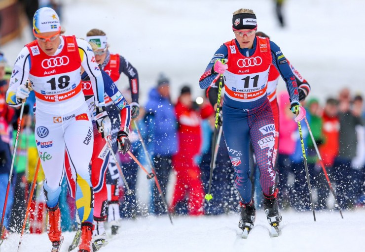 Jessie Diggins (11) during her quarterfinal of the 1.2 k classic sprint at Stage 4 of the Tour de Ski in Oberstdorf, Germany. The American placed fifth after crashing with Hanna Falk (18). (Photo: Marcel Hilger)