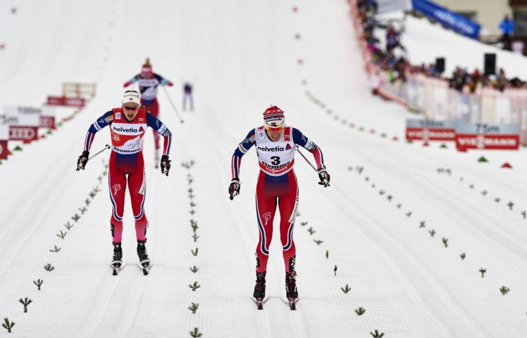 Heidi Weng (r) outlasts Norwegian teammate Ingvild Flugstad Østberg (l) in the final meters of the 10 k classic mass start to win Stage 7 of the Tour de Ski in Val di Fiemme, Italy. It was Weng's first-career World Cup victory after 37 World Cup podiums. (Photo: Madshus/NordicFocus)