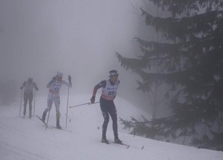 (Right to left) American Scott Patterson, Sweden's Martin Johansson, and Germany's Lucas Boegl  skiing through the "smog" during the men's 50 k classic mass start Holmenkollen race on Saturday in Oslo, Norway. (Photo: Caitlin Patterson) 