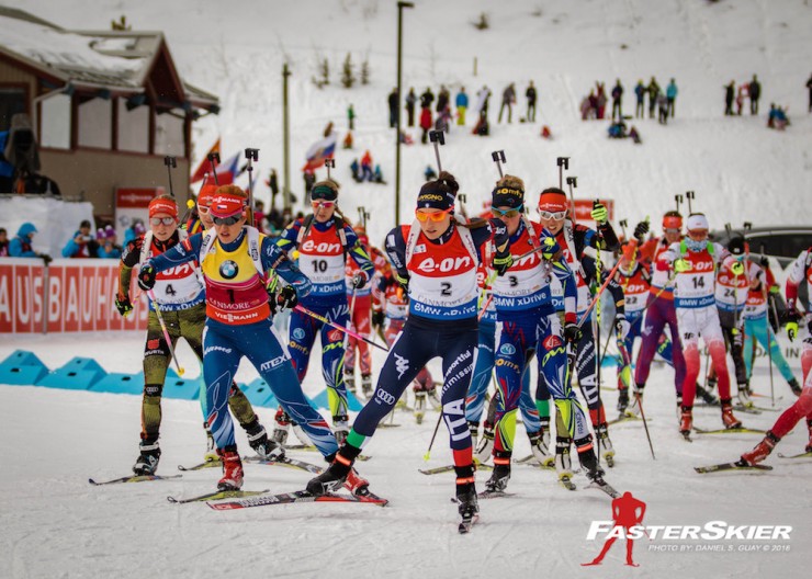 Italy's Dorothea Wierer (2) leads out of the start of the women's 12.5 k mass start at the IBU World Cup on Saturday in Canmore, Alberta, along with Gabriela Soukalova (1) in the World Cup leader's bib. (Photo: Daniel S. Guay)