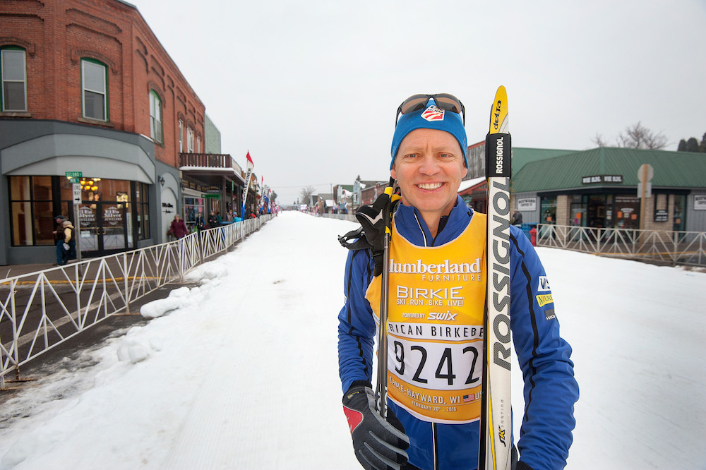 USSA President and CEO Tiger Shaw is ready to race, posing on Main Street before the American Birkebeiner. (Photo: USSA/Tom Kelly)