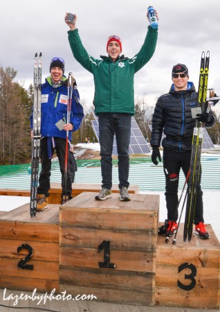 An excited Paddy Caldwell (Dartmouth College/SMST2/USST) (center) standing in first next to second place finisher, Tad Elliot (SSCV) (l) and third place finisher, Kris Freeman (Team Freebird) during the podium ceremony for the men's 10 k freestyle individual start SuperTour even on Saturday in Craftsbury, Vermont.  (Photo: John Lazenby/Lazenbyphoto.com)