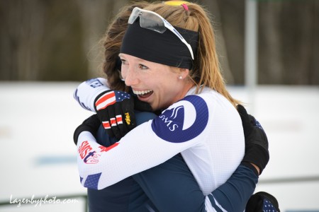 Erika Flowers (SMST2) (r) getting a congratulatory hug after winning the women's SuperTour 10 k classic individual start on Sunday in Craftsbury, Vermont.  (Photo: John Lazenby/Lazenbyphoto.com)