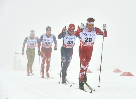 Left to right: Canadian Devon Kershaw leads, American Noah Hoffman, Norway's Vebjoern Turtveit and Germany's Thomas Wick during the men's 50 k classic mass start Holmenkollen race on Saturday in Oslo, Norway. (Photo: Fischer/NordicFocus) 