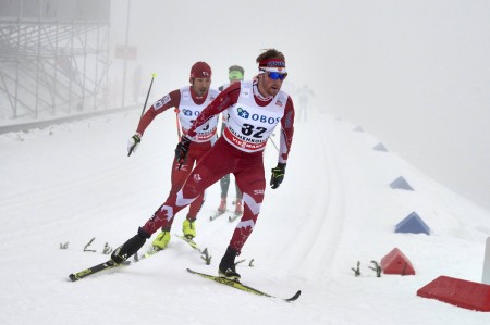 Canadian skier Graeme Killick (bib no. 32) leads Japan's during the men's 50 k classic mass start Holmenkollen race on Saturday in Oslo, Norway. (Photo: Fischer/NordicFocus) 