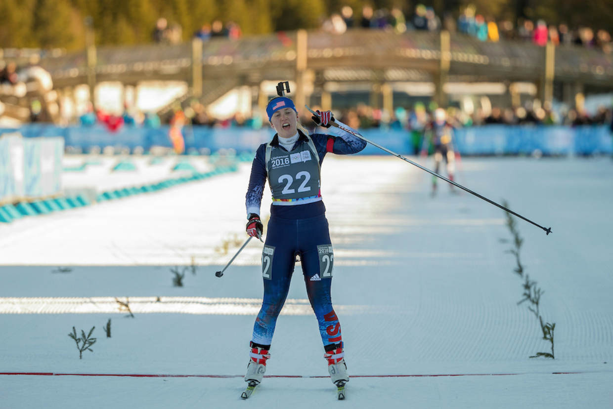 Chloe Levins of Rutland, Vermont, celebrates as she crosses the Youth Olympic Games finish line in fourth place in the 7.5 k pursuit. (Photo: Al Tielemans for YIS/IOC Handout image supplied by YIS/IOC)