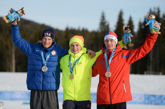 American Ben Loomis (left) standing with podium finishers, Germany's Tim Kopp, the winner, and the Czech Republic’s Ondrej Pazout in third. (Photo: YIS/IOC-Thomas Lovelock)