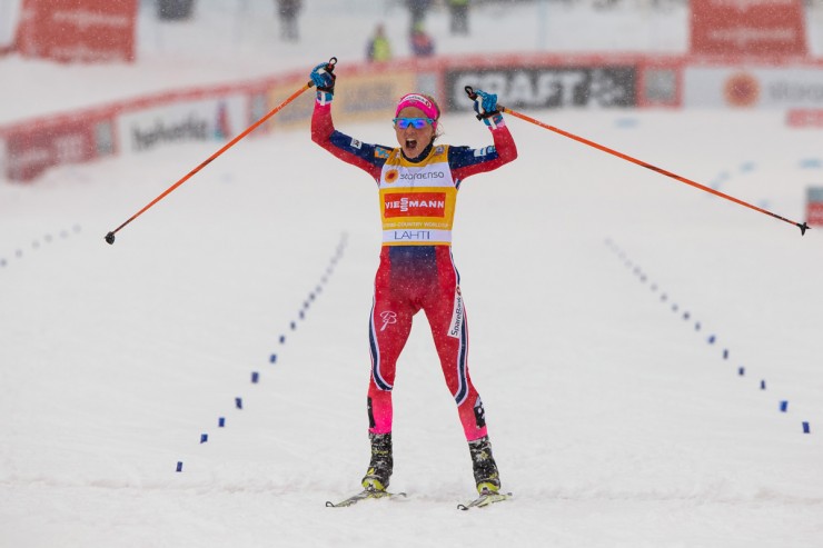 Norway's Therese Johaug winning Sunday's 15 k skiathlon in Lahti, Finland, for her 15th World Cup victory this season. (Photo: Fischer/NordicFocus)