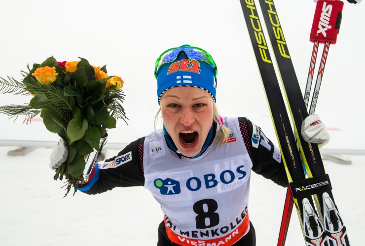Finland's Anne Kyllönen celebrates her podium in the Holmenkollen 30 k classic, after placing third on Sunday in Oslo, Norway. (Photo: Fischer/NordicFocus)