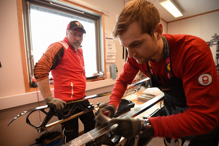 Canadian wax technicians Mike Mappin (l) and Camille Cheskey (r) hard at work during the during the 2016 Winter Youth Olympic Games on Feb. 10 in Lillehammer Norway. (Photo: Jon Buckle for YIS/IOC)  
