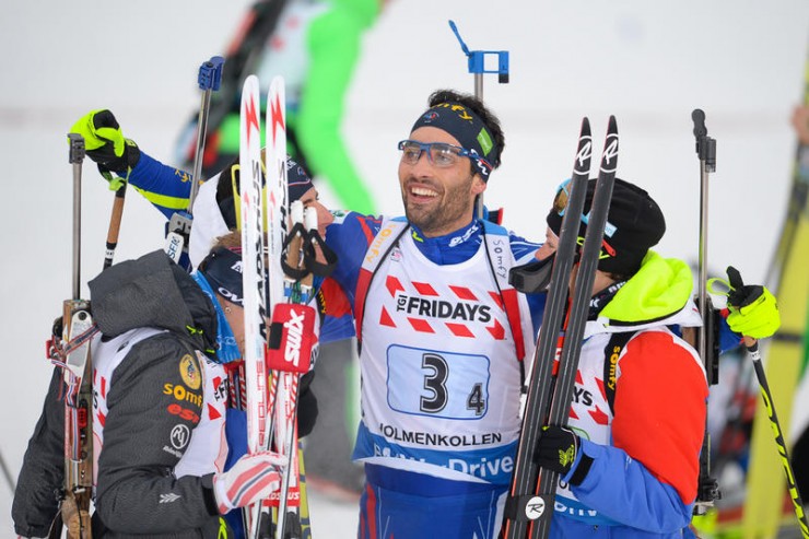 Martin Fourcade celebrates with his teammates after anchoring France's mixed relay to gold in the first race of 2016 IBU World Championships in Oslo, Norway. (Photo: IBU)