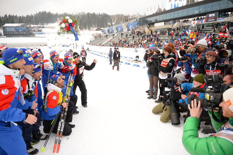 Martin Fourcade celebrates with his team after his fourth gold medal. (Photo: IBU/Evgeny Tumashov)