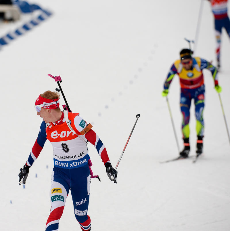 An elated Johannes Thingnes Bø of Norway crosses the line for gold in front of a roaring hometown crowd in the men's 15 k mass start of World Championships. (Photo: IBU/Evgeny Tumashov)