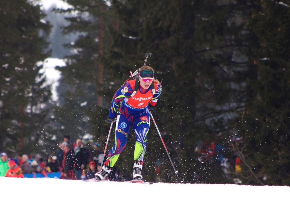 Anais Bescond of France racing to fifth in the women's 12.5 k mass start at 2016 IBU World Championships in Oslo, Norway. (Photo: JoJo Baldus)