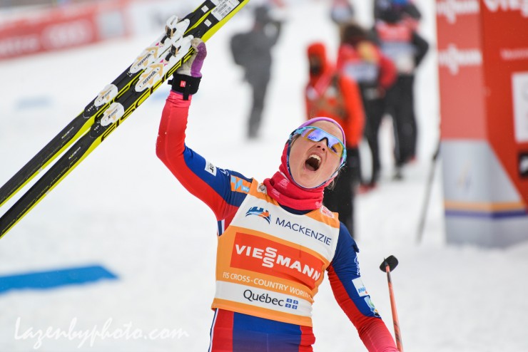 Norway's Therese Johaug celebrates her one-minute victory in the women's 10.5 k classic mass start at Stage 2 of the Ski Tour Canada. The win put her first in the Tour standings, 26.8 seconds ahead of teammate Heidi Weng. (Photo: John Lazenby/Lazenbyphoto.com)