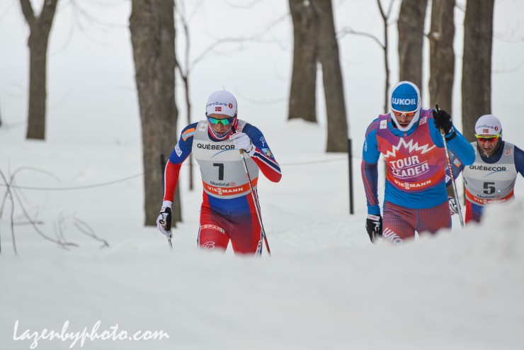 Norway's Emil Iversen (l) and Russia's Sergey Ustiugov (red leader's bib) lead the men's 17.5 k classic mass start at the second stage of the Ski Tour Canada, while Norway's Petter Northug trails in third. Iversen went on to win, Northug placed second and Ustiugov took third. (Photo: John Lazenby/Lazenbyphoto.com)