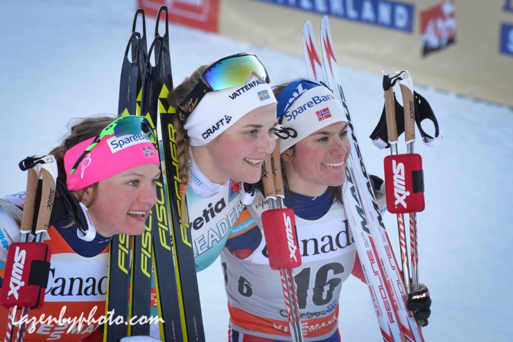 The women's freestyle sprint podium at the third stage of the Ski Tour Canada in Quebec City, with Swedish winner Stina Nilsson (c), Norway's Sprint World Cup champion Maiken Caspersen Falla (l) in second and Heidi Weng (16) of Norway in third. (Photo: John Lazenby/Lazenbyphoto.com)