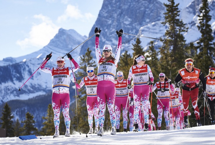Kikkan Randall (U.S. Ski Team) and former Canadian national team member Chandra Crawford  leading the Fast and Female forerunners before the Tuesday's classic sprint at Stage 5 of the Ski Tour Canada in Canmore, Alberta. (Photo: Fischer/NordicFocus)