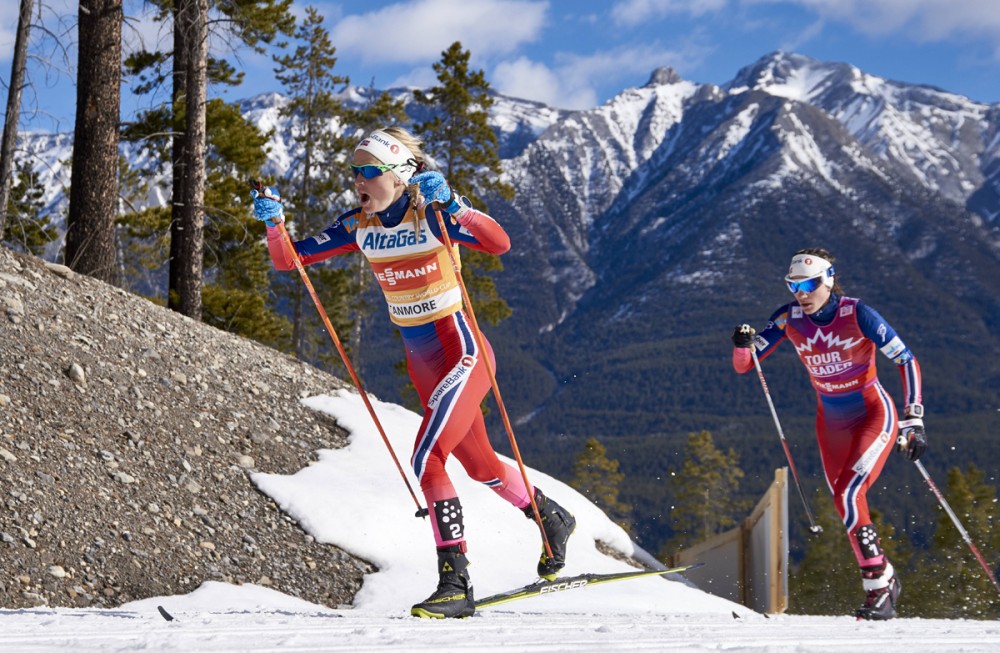 Therese Johaug and Norwegian teammate Heidi Weng during the women's 15 k skiathlon  in Canmore, Alberta. The competition was part of the Ski Tour Canada, one of many World Cup events Johaug won last season. (Photo: Fischer/NordicFocus)