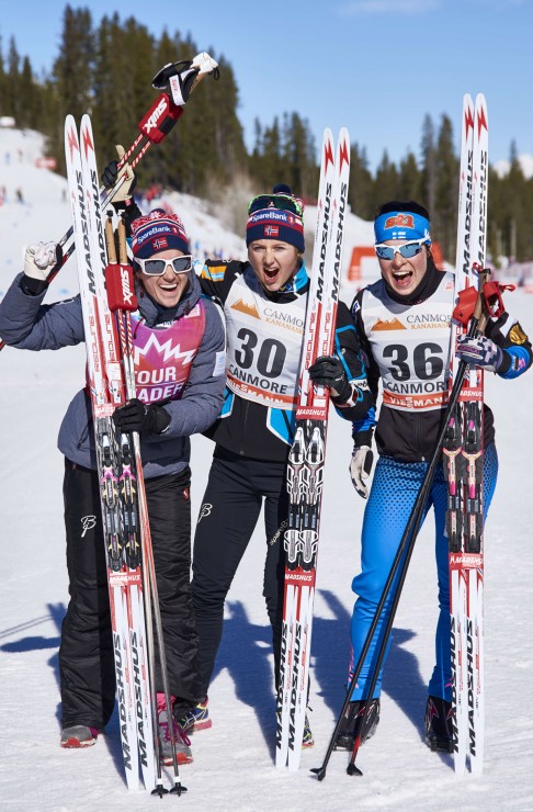 Finland's Krista Parmakoski (r) broke up an all-Norwegian sweep of Friday's 10 k freestyle podium, placing third behind Norwegian winner Ingvild Flugstad Østberg (c), and runner-up Heidi Weng (l) also from Norway, in Stage 7 of the Ski Tour Canada in Canmore, Alberta. (Photo: Fischer/Nordic Focus)