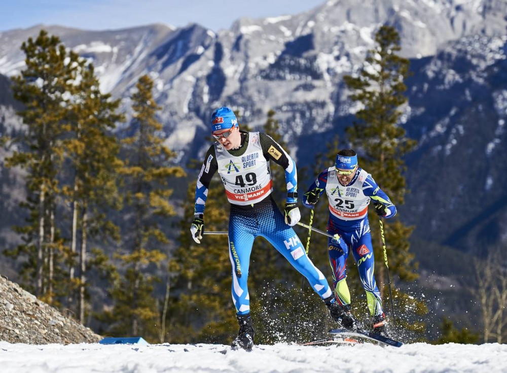 Finland's Matti Heikkinen (l) and France's  Robin Duvillard during the men's 15 k freestyle individual start race on Friday in Canmore, Alberta. (Photo: Fischer/NordicFocus)
