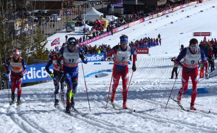 The men's classic sprint final on Tuesday in Canmore, Alberta, with France's Maurice Manificat (17) and Finn Hagen Krogh (9) leading up the first of two climbs. (Photo: Peggy Hung)