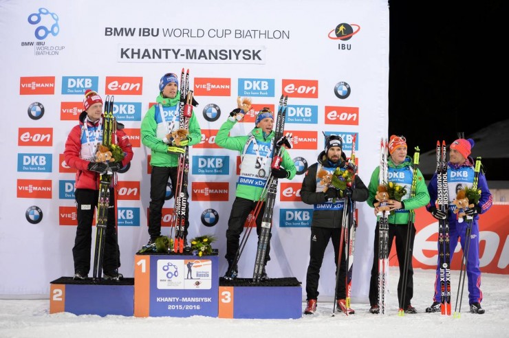 The men's pursuit flower ceremony on Saturday in Khanty-Mansiysk, Russia, with winner Simon Schempp (second from l) of Germany, Norway's Johannes Thingnes Bø (l) in second, Germany's Erik Lesser (third from left) in third, and (from left to right) Switzerland's Benjamin Weger in fourth, Germany's Benedikt Doll in fifth, and American Tim Burke in sixth.