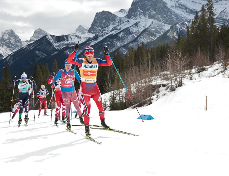 Sundby breaking apart the skate leg into a 12-skier pack during the men's 30 k skiathlon at Stage 6 of the Ski Tour Canada in Canmore, Alberta. 
