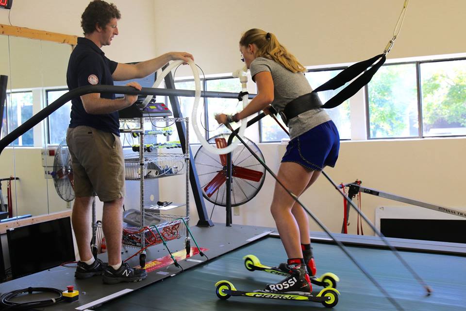 Central Cross Country (CXC) Junior Development skier Siri Martin (r) gets a mid-summer VO2 max test on the rollerski treadmill at the Center of Excellence in Madison, Wisc. in late July (Photo: CXC Facebook)