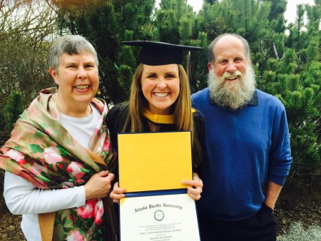 Holly Brooks with her parents at her recent graduations. Brooks received a Masters in Counseling Psychology from Alaska Pacific University. (Courtesy Photo)