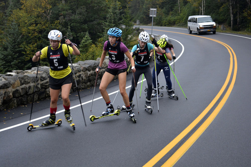 St. Lawrence's Jackie Garso (5) leads Stratton's Anna Lehmann (3) and CSU's Hannah Rieders (7), Gabby Vandendries (4), and Madeline Rieders (in back)  during the women's Climb to the Castle rollerski race up Whiteface Mountain on Sunday in Wilmington, N.Y. (Photo: NYSEF/Flickr)