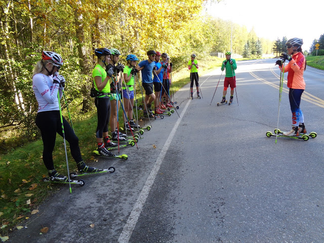The University of Alaska Anchorage nordic team talks technique with assistant coach Sara Studebaker-Hall during a rollerski session last Tuesday in Kincaid Park. (Photo: UAA Nordic)