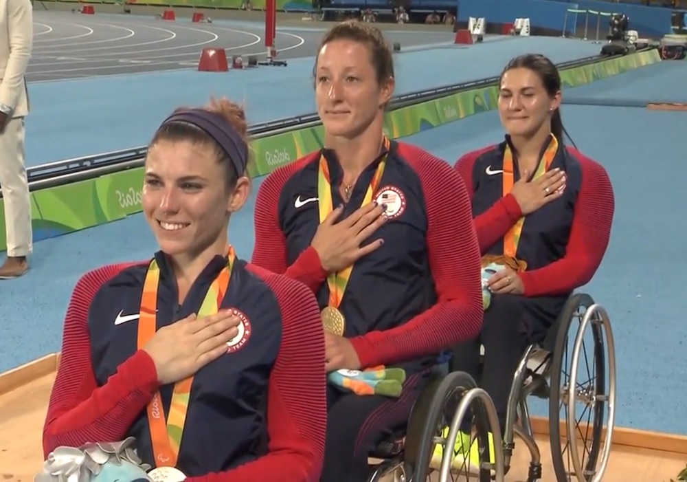 Tatyana McFadden (c) led a U.S. sweep of the women's 1500-meter T53/54 podium in wheelchair track racing at the 2016 Summer Paralympics on Wednesday in Rio de Janeiro, Brazil. Less than two-tenths of a second behind her, Amanda McGrory (l) and Chelsea McClammer (r) placed second and third, respectively. (Photo: U.S. Paralympics Highlights from Rio Day 6 video)