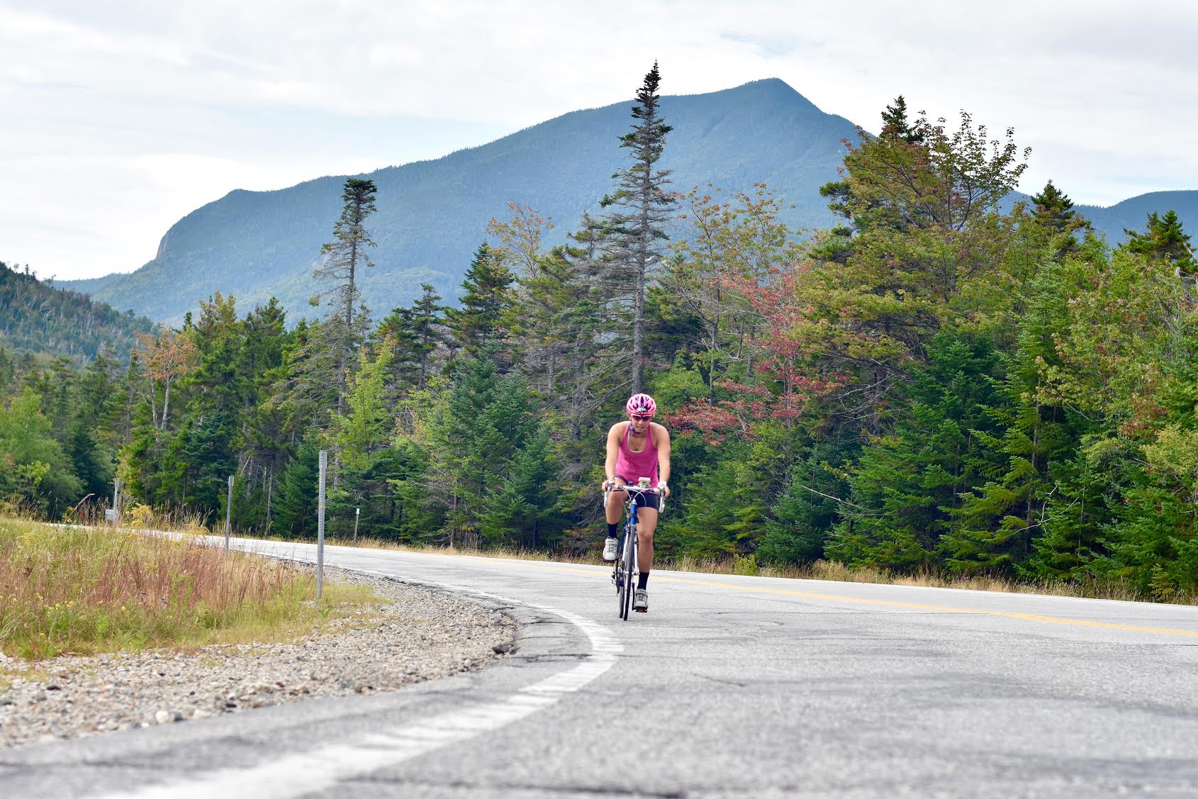 Julia Kern biking up New Hampshire's Kancamagus Highway at a recent training camp. (Courtesy photo)