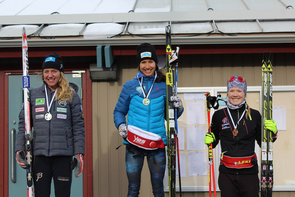The women's 8.1 k freestyle podium at the Alberta Cup in Canmore, Alberta, with winner Chelsea Holmes (c), of APU, Caitlin Gregg (l), of Team Gregg, in second, and Biathlon Canada’s Emma Lunder (r) in third. (Photo: annas4036/flickr)