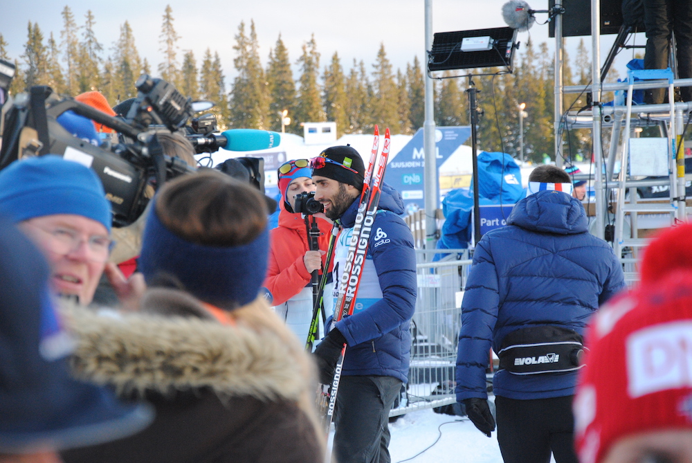 Martin Fourcade of France prepares to take the podium after his win in the 10 k sprint in Sjusjøen, Norway.