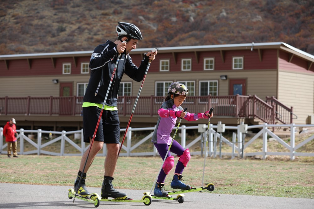Ben Saxton (SMST2) skis with a junior athete during a skate ski at the USST's annual training camp in Park City, Utah, which ran this year from Oct. 17 until Oct. 31. (Photo: Liz Arky)  