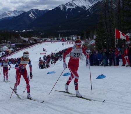 Dahria Beatty ahead of Therese Johaug at Ski Tour Canada in Canmore (Photo: Peggy Hung)