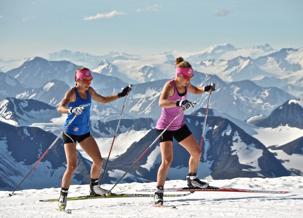Sophie Caldwell (l) follows U.S. teammate Ida Sargent during the 2016 U.S. Ski Team camp in Alaska this summer. (Photo: Matt Whitcomb/U.S. Ski Team)