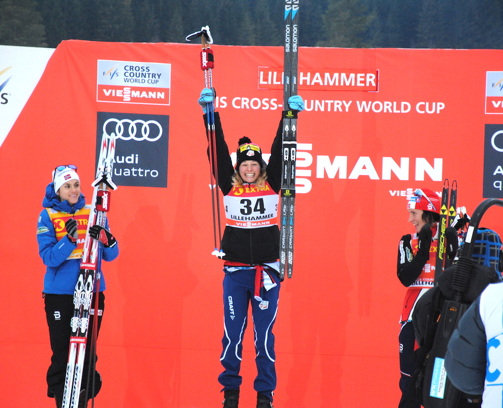 Jessie Diggins (c) celebrating her second career World Cup and sixth individual podium on Saturday in the 5 k freestyle in Lillehammer, Norway. She shared the podium with two Norwegians, Heidi Weng (l) in second and Marit Bjørgen (r) in third. (Photo: Aleks Tangen)