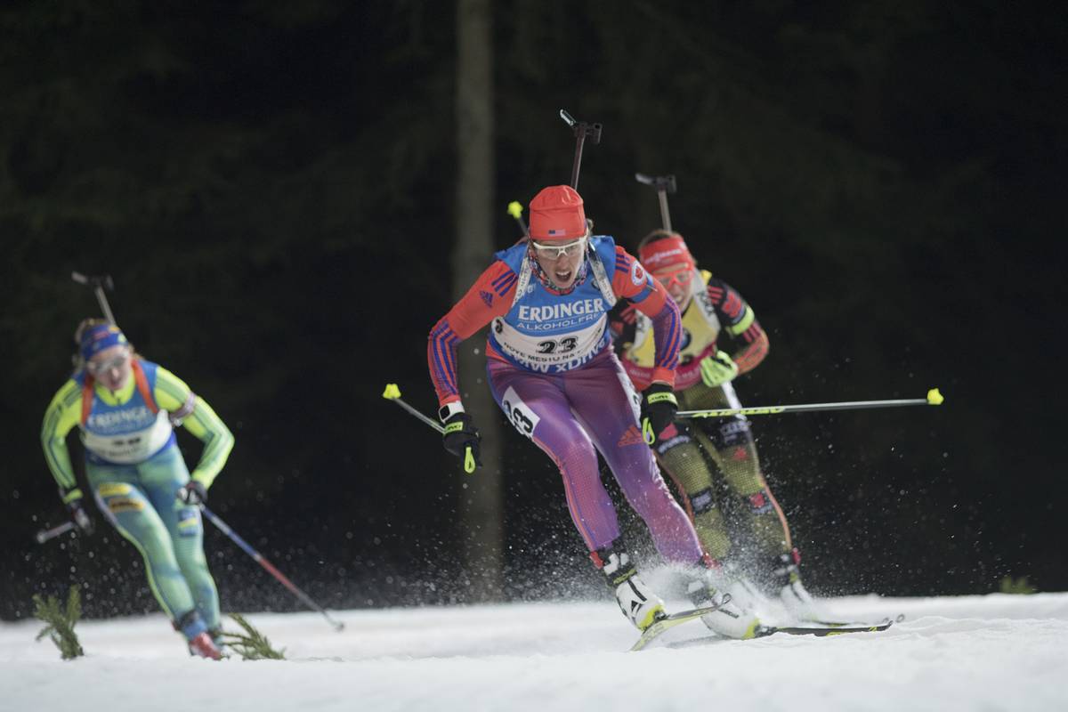 Susan Dunklee (c) leads overall World Cup leader Laura Dahlmeier (r) of Germany in the women's 7.5 k sprint on Friday at the IBU World Cup in Nove Mesto, Czech Republic. Dunklee went on to place third ahead of Dahlmeier in fourth. (Photo: USBA/NordicFocus)