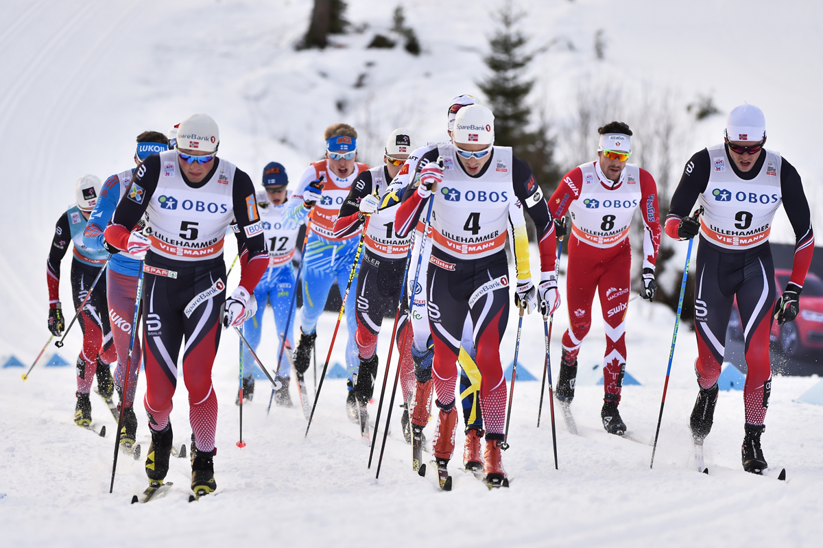 Norway's Finn Hågen Krogh (4) and Emil Iversen (5) leading the charge in the men's 15 k classic pursuit on the final day of the World Cup mini tour in Lillehammer, Norway, with Canadian Alex Harvey (8) in the mix. (Photo: Fischer/NordicFocus.com)