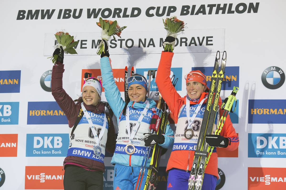 The women's sprint podium at the IBU World Cup on Friday in Nove Mesto, Czech Republic, with (left to right) France’s Anaïs Chevalier in second, Russia’s Tatiana Akimova in first, and US Biathlon’s Susan Dunklee in third. (Photo: USBA/NordicFocus)