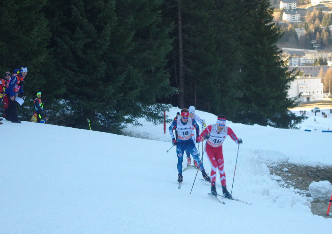 Alex Harvey of Canada leading Noah Hoffman of the United States and Sweden's Jens Burman in the 30 k skate in Davos, Switzerland.