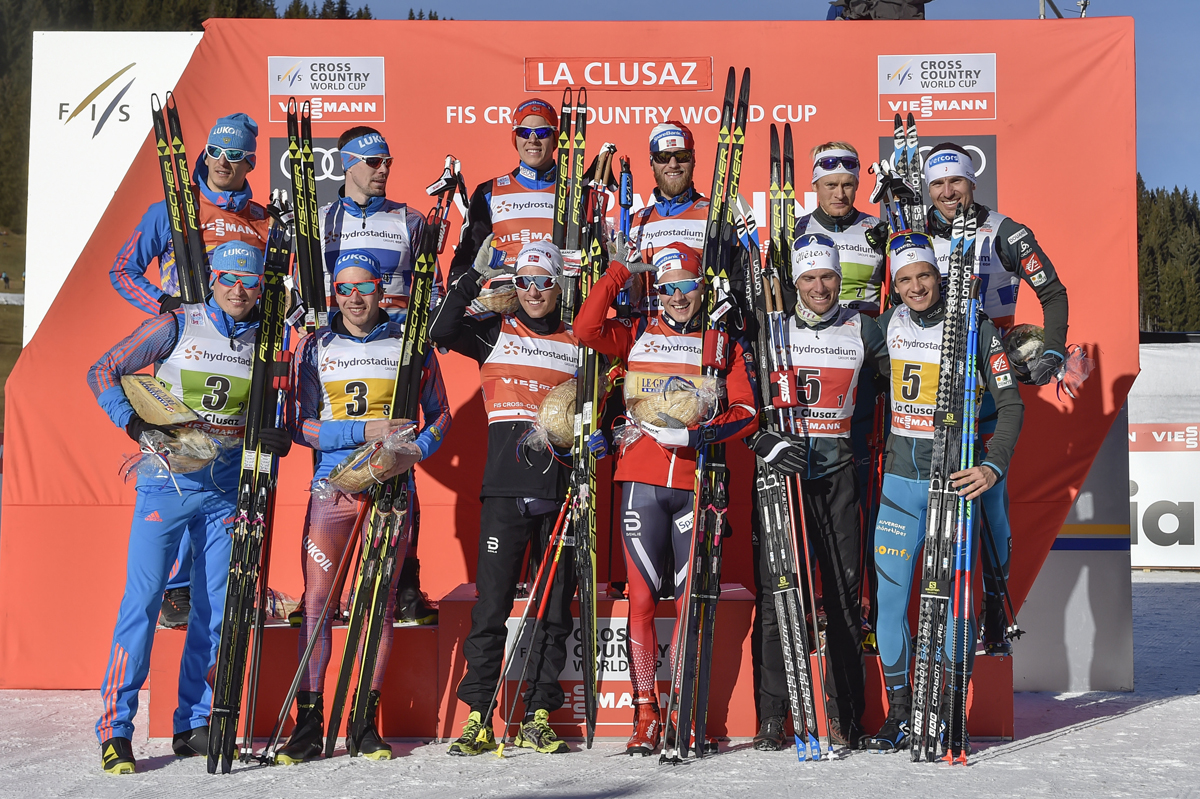 The men's relay podium at the La Clusaz World Cup on Sunday, with Norway in first (c), Russia in second (l) and France with its first World Cup podium in eighth years in third (r). (Photo: Fischer/Nordic Focus)