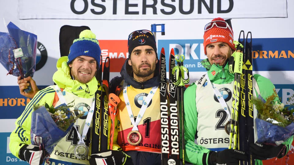 The men's sprint podium at the IBU World Cup in Östersund, Sweden. From left to right: Sweden’s Fredrik Lindström in second, France’s Martin Fourcade in first, and Germany’s Arnd Peiffer in third. (Photo: IBU)