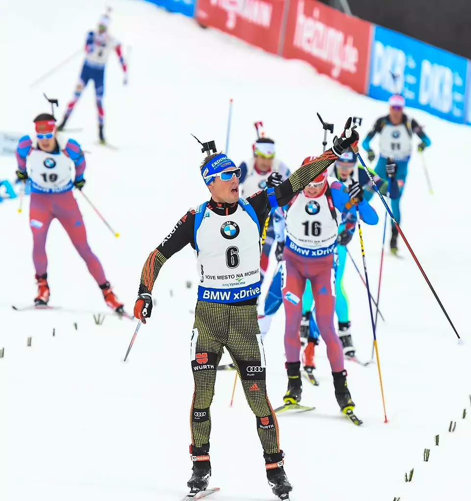 Germany’s Simon Schempp celebrates his second place as he crosses the line of the men’s 15 k mass start on Sunday at the IBU World Cup in Nove Mesto, Czech Republic. Russia’s Anton Babikov (16) secured third place ahead of seven others. (Photo: IBU)
